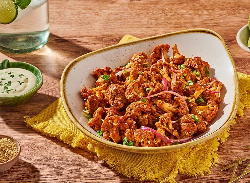 bites de coliflor con salsa de chilorio